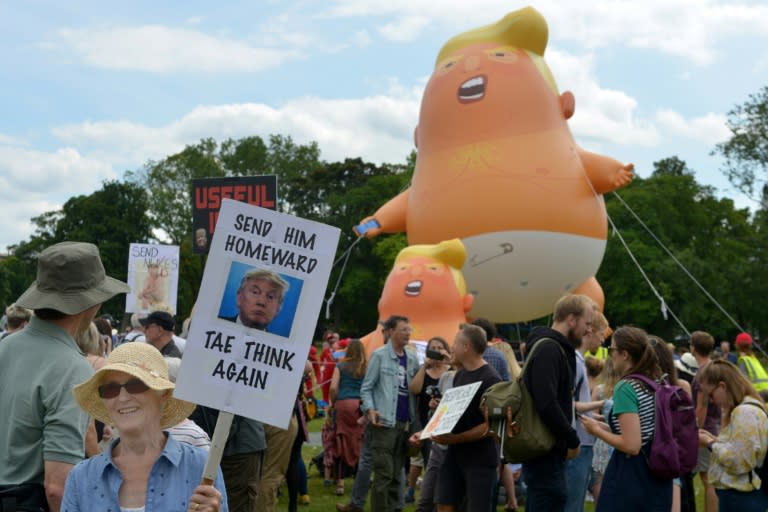 A giant balloon depicts US President Donald Trump as an orange baby at protests over his UK trip