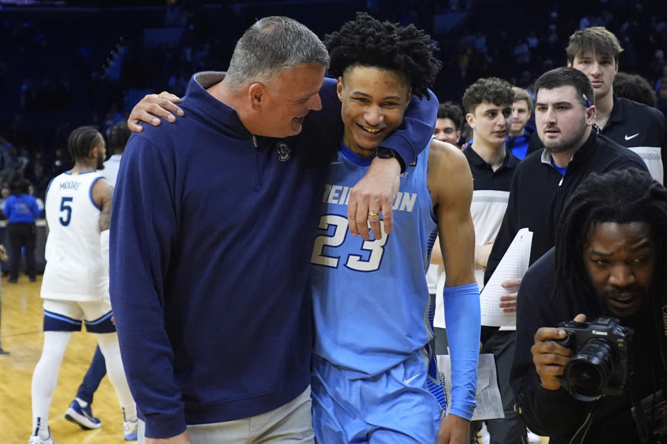 Creighton head coach Greg McDermott, left, and Trey Alexander react after Creighton won an NCAA college basketball game against Villanova, Saturday, March 9, 2024, in Philadelphia. (AP Photo/Matt Slocum)