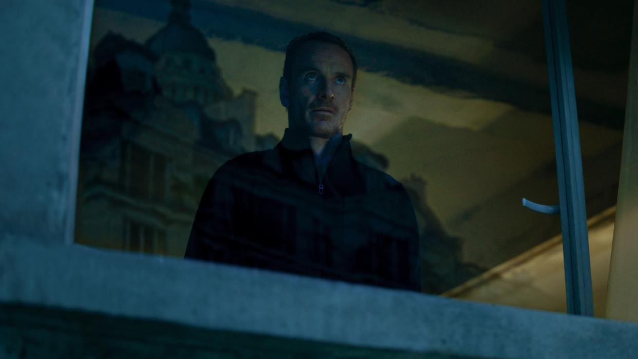  The Killer ending explained. Seen here is Michael Fassbender as an assassin in The Killer. 