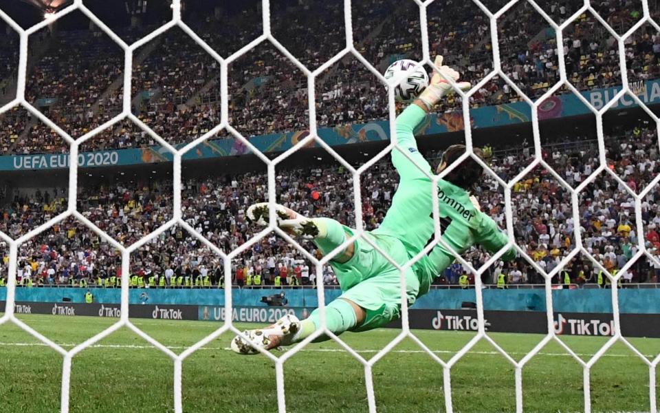 Switzerland's goalkeeper Yann Sommer with the key moment - AFP/Getty