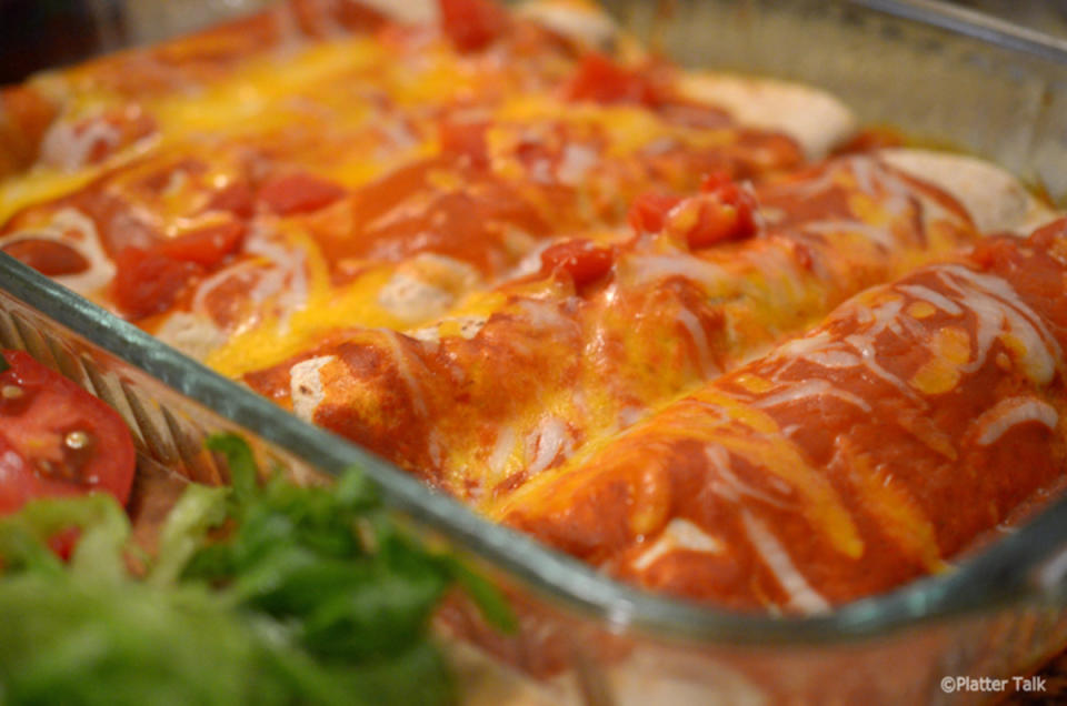 <p>Platter Talk</p><p>These meaty enchiladas are easy to put together...they're just as tasty using leftover steak or beef! They serve as an attractive and delicious option at graduation parties, whether you are hosting the big event or just bringing a dish to pass around.</p><p><strong>Get the recipe: <a href="http://www.plattertalk.com/steak-beef-enchiladas/" rel="nofollow noopener" target="_blank" data-ylk="slk:Steak Enchiladas;elm:context_link;itc:0;sec:content-canvas" class="link ">Steak Enchiladas</a></strong></p>