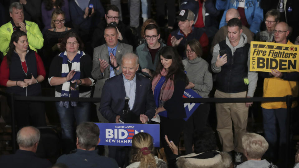 Democratic presidential candidate former Vice President Joe Biden smiles as he arrives for a gathering during a campaign stop in Exeter, N.H., Monday, Dec. 30, 2019. (AP Photo/Charles Krupa)