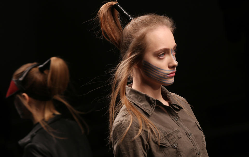 A model performs a walk through ahead of the show by Haizhen Wang during London Fashion Week, at Somerset House in central London, Tuesday, Feb. 19, 2013. (Photo by Joel Ryan/Invision/AP)