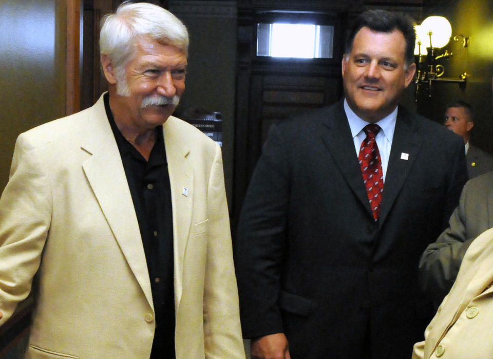 Steve Penny, right, was president and CEO of USA Gymnastics from 2005-2017. He resigned in March and received a $1 million severance package. (AP)