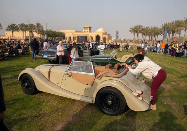 Automobile enthusiasts visit a classic car show in Cairo, Egypt