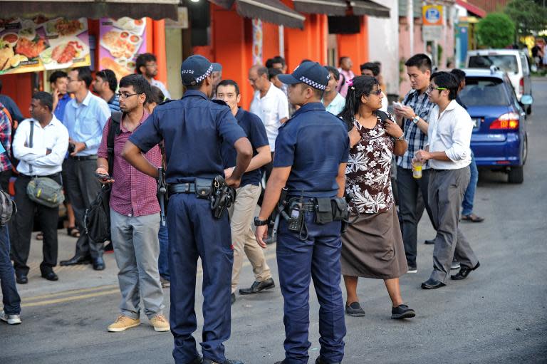 Singapore must now confront its foreign worker dilemma. (AFP News)