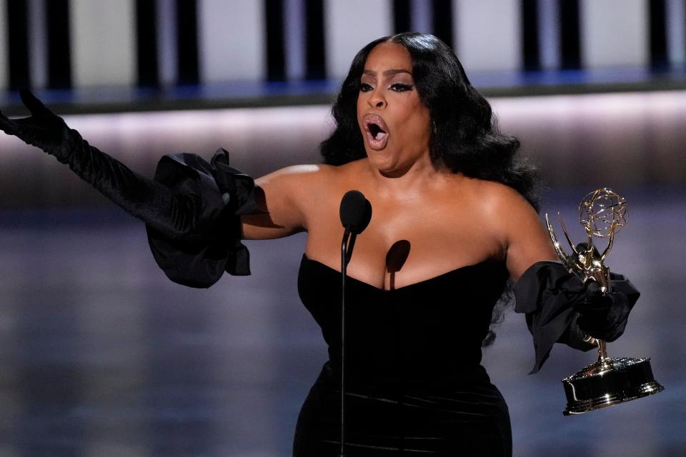 Niecy Nash-Betts accepts the award for outstanding supporting actress in a limited or anthology series or movie at the 75th Emmy Awards.