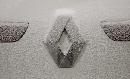 FILE PHOTO: The logo of French car manufacturer Renault is seen during a snow test at the Jules Verne climatic wind tunnel atÊthe Scientific and Technical Center for Building (CSTB) research laboratory, that can simulate and analyze the behaviour of structures under extreme temperature weather conditions, with snow, sand storms, fog, as well as hurricaines with winds up to 280 km per hour, in Nantes, France, April 26, 2019. REUTERS/Stephane Mahe