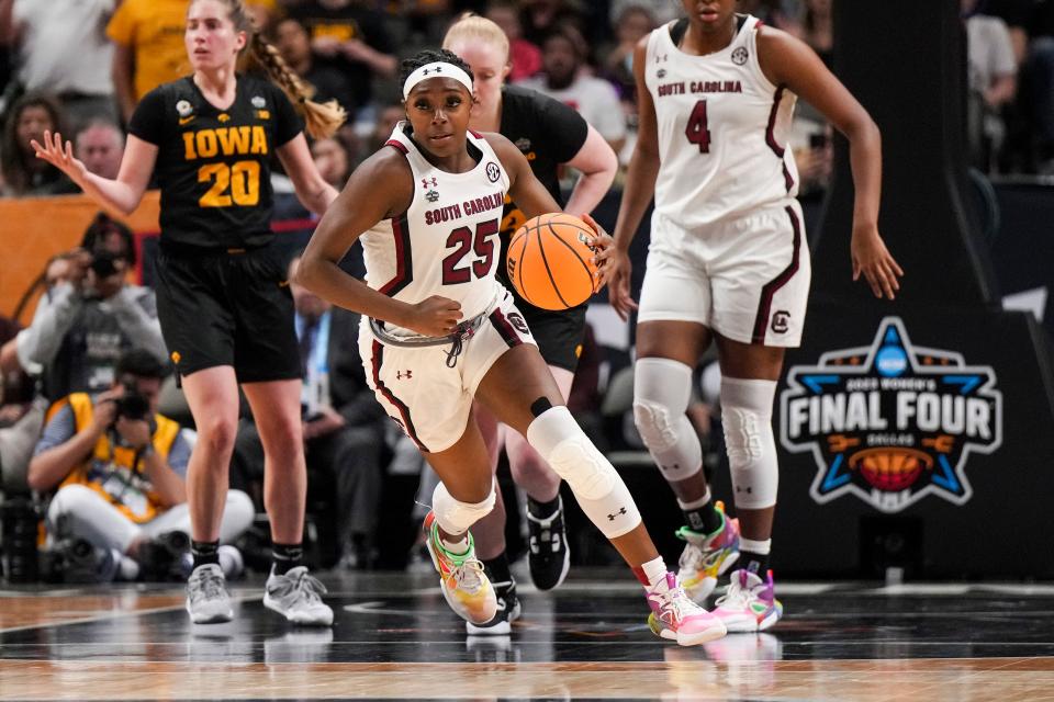 Mar 31, 2023; Dallas, TX, USA; South Carolina Gamecocks guard Raven Johnson (25) brings the ball up court against the Iowa Hawkeyes in the second half in semifinals of the women's Final Four of the 2023 NCAA Tournament at American Airlines Center. Mandatory Credit: Kirby Lee-USA TODAY Sports