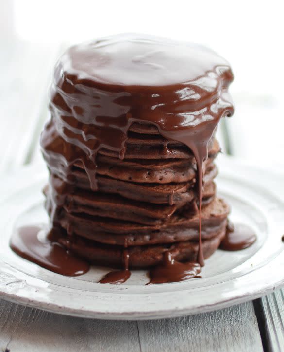 <strong>Get the <a href="http://www.halfbakedharvest.com/chocolate-lovers-pumpkin-fudge-brownie-pancakes-chocolate-kahlua-sauce/" target="_blank">Chocolate Lovers Pumpkin Fudge Brownie Pancakes recipe</a> from Half Baked Harvest</strong>