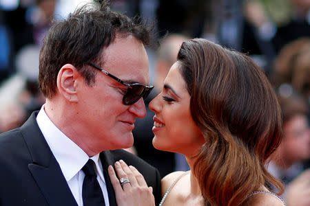 72nd Cannes Film Festival - Screening of the film "Once Upon a Time in Hollywood" in competition - Red Carpet Arrivals - Cannes, France, May 21, 2019. Director Quentin Tarantino poses with his wife Daniella Pick. REUTERS/Stephane Mahe