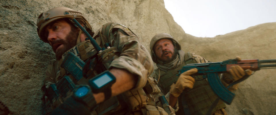 This image released by Metro Goldwyn Mayer Pictures shows Jake Gyllenhaal as Sgt. John Kinley, left, and Dar Salim as Ahmed in a scene from "Guy Ritchie's The Covenant." (Christopher Raphael/Metro Goldwyn Mayer Pictures via AP)