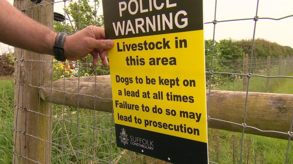 Police sign warning dog walkers to keep animals on leads