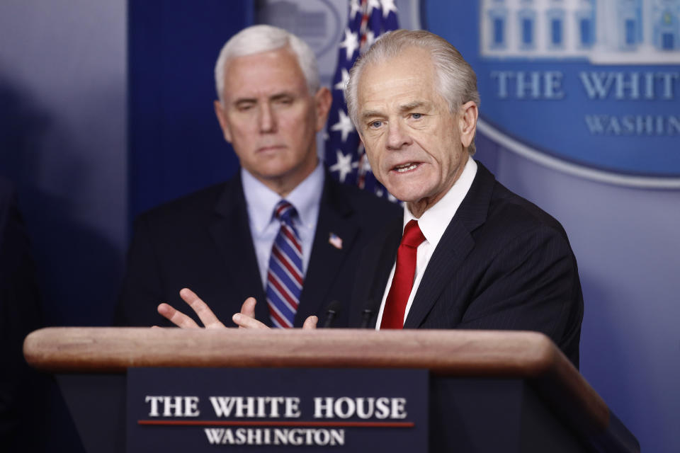 FILE - In this March 22, 2020, file photo, White House trade adviser Peter Navarro speaks during a coronavirus task force briefing at the White House, in Washington, as Vice President Mike Pence listens. Navarro’s eagerness to confront, attack and be, as one former associate put it, “a real jerk to people” didn’t serve him well as a political candidate in the 1990s. But it fits what President Donald Trump was looking for to muscle companies to make critical supplies needed to fight the coronavirus. (AP Photo/Patrick Semansky, File)