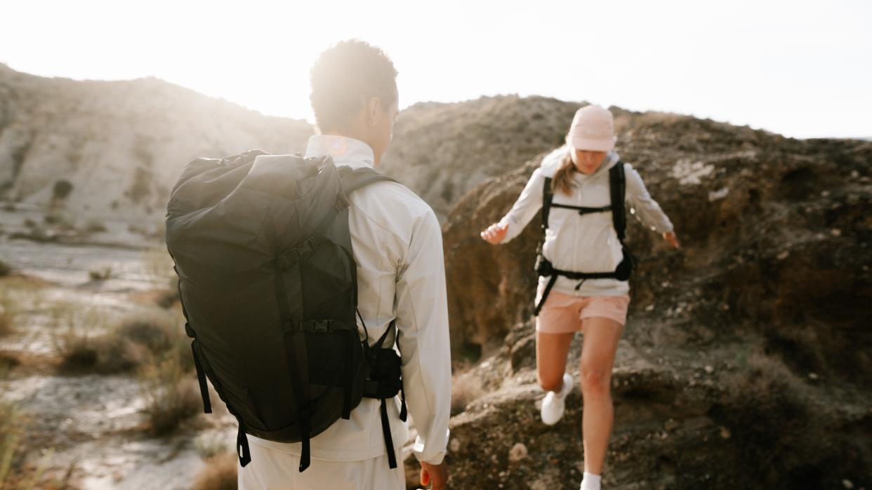  Hikers wearing the new 3D printed backpack. 