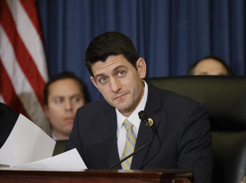 FILE - In this Feb. 5, 2014 file photo, House Budget Committee Chairman Rep. Paul Ryan, R-Wis. listens on Capitol Hill in Washington. Striving for unity among Democrats rather than compromise with Republicans, President Barack Obama unveils an election-year budget on Tuesday that drops cuts to Social Security and seeks new money for infrastructure, education and job training. Congress will likely approve a smaller amount based on last year's budget deal. (AP Photo/J. Scott Applewhite, File)