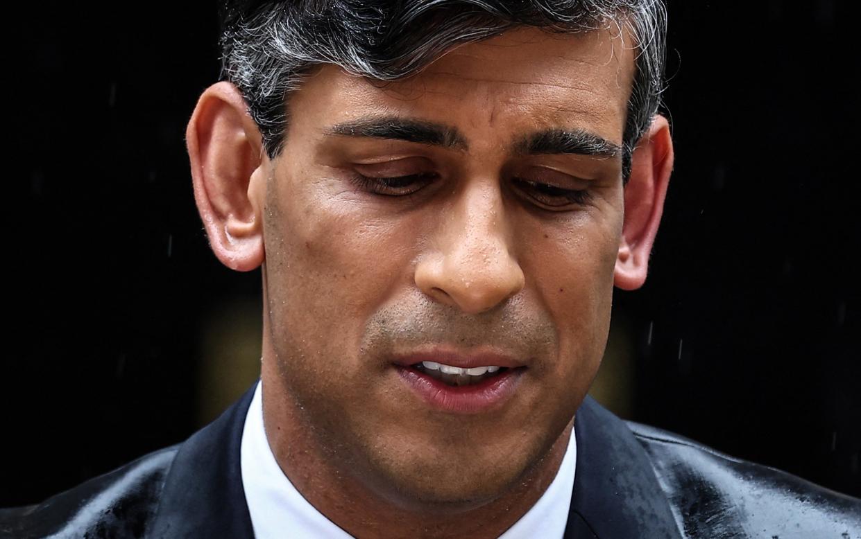 Britain's Prime Minister Rishi Sunak delivers a speech to announce July 4 as the date of the UK's next general election, at 10 Downing Street in central London, on May 22, 2024