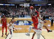 March 30, 2019; Anaheim, CA, USA; Texas Tech Red Raiders guard Brandone Francis (1) shoots against Gonzaga Bulldogs forward Killian Tillie (33) during the second half in the championship game of the west regional of the 2019 NCAA Tournament at Honda Center. Mandatory Credit: Robert Hanashiro-USA TODAY Sports