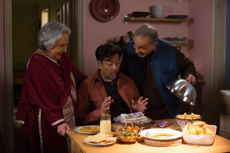 Tuesday, May 22: Masood is presented with money