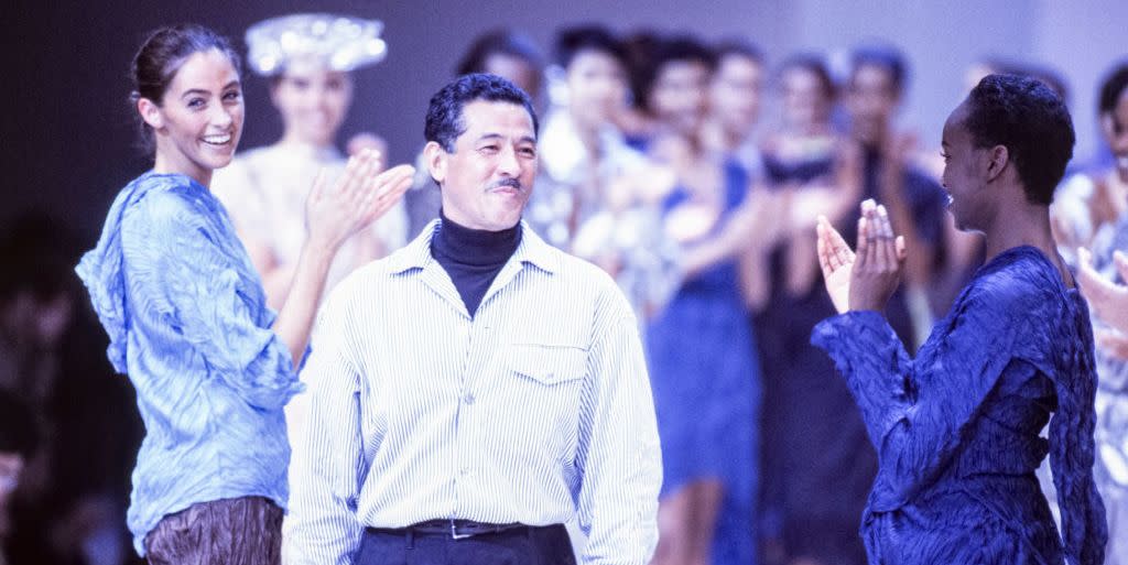 Photo credit: Issey Miyake takes a bow at his Spring 1992 show. Pool ARNAL/GARCIA - Getty Images