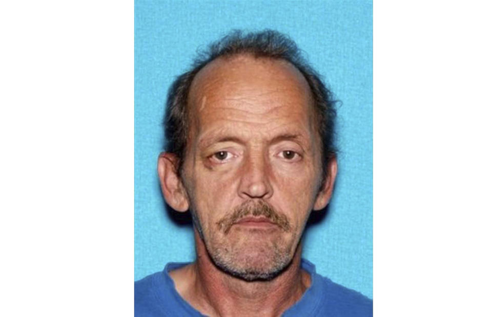 This photo provided by Montgomery County Sheriff's Office shows Kirby Gene Wallace. Authorities say they’re closing in on Wallace, a multiple-murder suspect in Tennessee, using helicopters and dogs in rugged terrain. Wallace has been spotted for a third time in Stewart County, where Sheriff Frankie Gray says his deputies are using K-9 units to encircle the suspect in a heavily wooded area. (Montgomery County Sheriff's Office via AP)