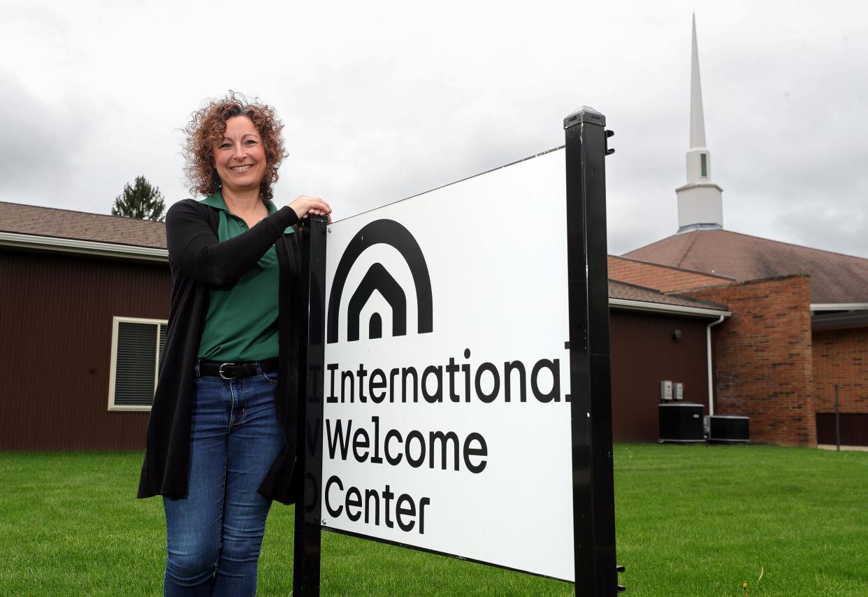 International Welcome Center Executive Director Christina Hodgkinson poses for a portrait outside the center based in Grace Bible Church in New Franklin.