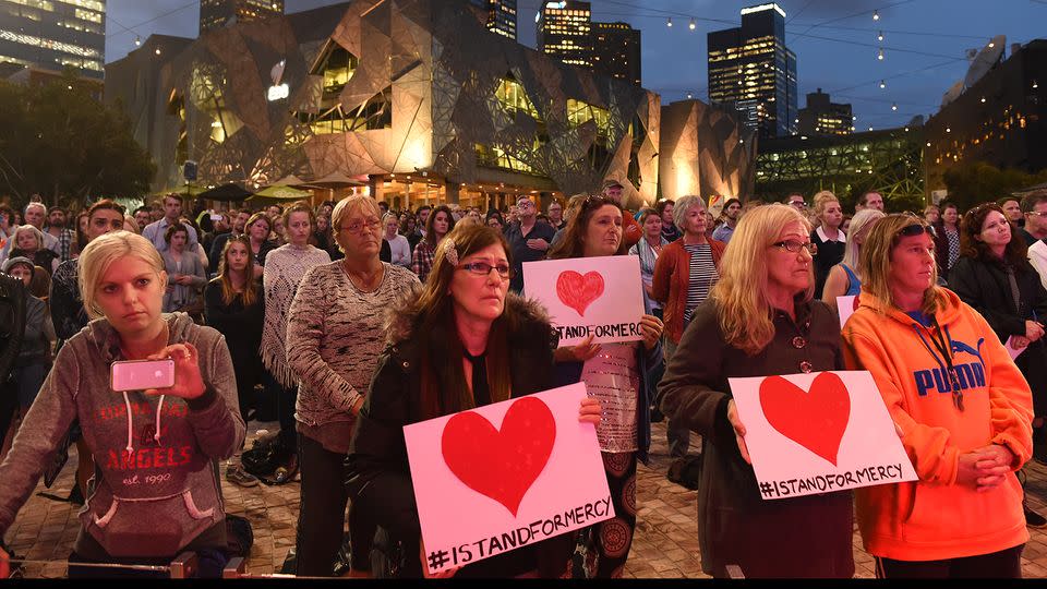 Supporters of Andrew Chan and Myuran Sukumaran gather for a vigil at Federation Square in Melbourne. Source: AAP