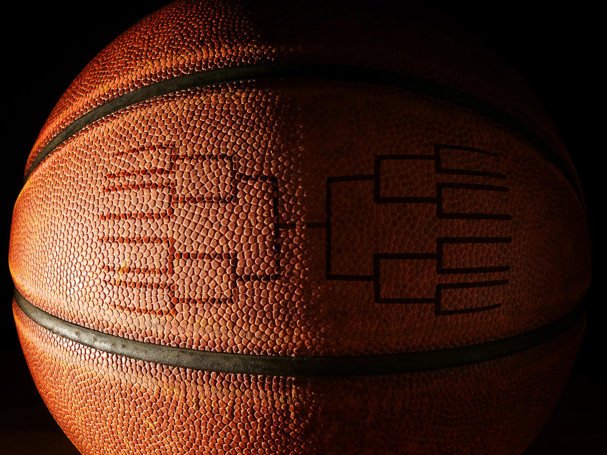 Closeup of a basketball with a tournament bracket design. From streaming to cable, here's how to watch or stream NCAA March Madness basketball. (Photo: Getty Images)