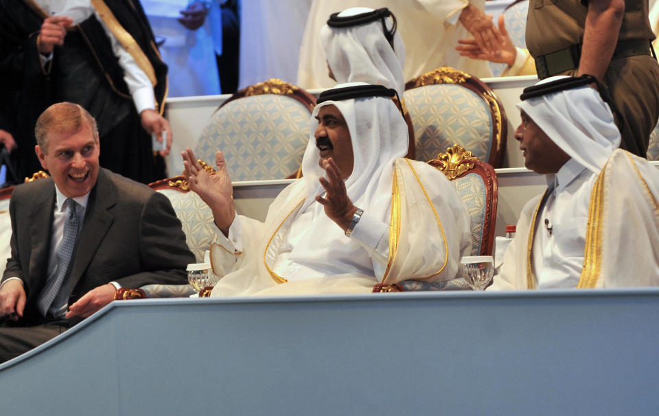 Qatari Emir Sheikh Hamad bin Khalifa al-Thani (C), Britain's Prince Andrew (L), the Duke of York, and Abdullah bin Hamad al-Attiyah, Qatar's deputy premier and minister of energy and industry, attend the inauguration ceremony of the Qatargas 2 plant in the northern Ras Laffan industrial zone on April 6, 2009. The Qatargas 2 project provides a production capacity of 15 million tonnes of liquefied natural gas per year.   AFP PHOTO/STR (Photo credit should read -/AFP via Getty Images)