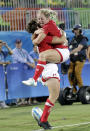 <p>Canada’s Kayla Moleschi, right, celebrates with teammate Ghislaine Landry, for scoring the winning try during the women’s rugby sevens quarter final match against France at the Summer Olympics in Rio de Janeiro, Brazil, Sunday, Aug. 7, 2016. (AP Photo/Themba Hadebe) </p>