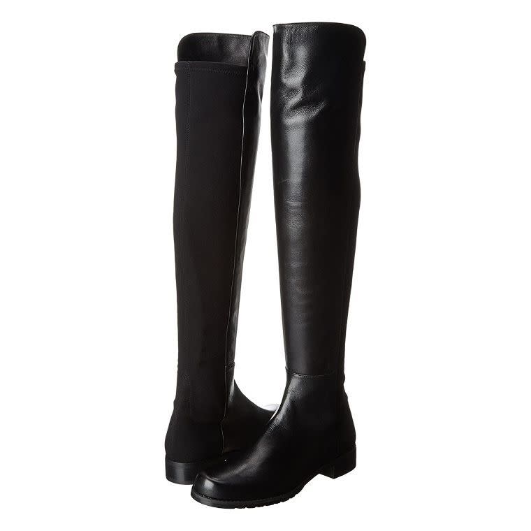 <p><strong>Stuart Weitzman</strong></p><p>amazon.com</p><p><strong>$695.00</strong></p><p><a href="https://www.amazon.com/dp/B07TCPPKKQ?tag=syn-yahoo-20&ascsubtag=%5Bartid%7C10056.g.40783377%5Bsrc%7Cyahoo-us" rel="nofollow noopener" target="_blank" data-ylk="slk:Shop Now;elm:context_link;itc:0;sec:content-canvas" class="link ">Shop Now</a></p><p>Stuart Weitzman's 5050 boot is a fall essential. These black leather knee-highs featuring a stretchy back panel will last you years to come and work with your entire wardrobe. </p>