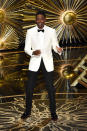 <p>Oscars host Chris Rock took the center stage wearing white — refreshingly — with black pants and accessories.</p>