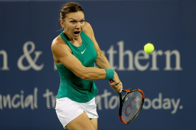 Simona Halep of Romania returns a shot to Ajla Tomjanovic of Australia during the Western & Southern Open, at Lindner Family Tennis Center in Mason, Ohio, on August 15, 2018