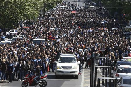 People march during a protest against the appointment of ex-president Serzh Sarksyan as the new prime minister in Yerevan, Armenia April 23, 2018. REUTERS/Vahram Baghdasaryan/Photolure