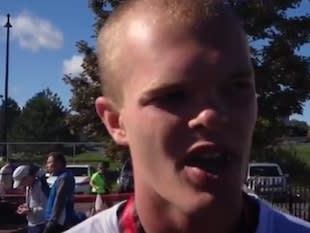 Jason 'J-Mac' McElwain after the 2012 Rochester Marathon — Democrat and Chronicle screen grab