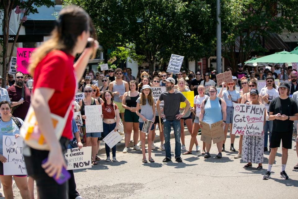 Addison Clapp addresses the crowd during an abortions rights rally in response to the U.S. Supreme Court decision overturning Roe v. Wade on Saturday, June 25, 2022 in downtown Athens.