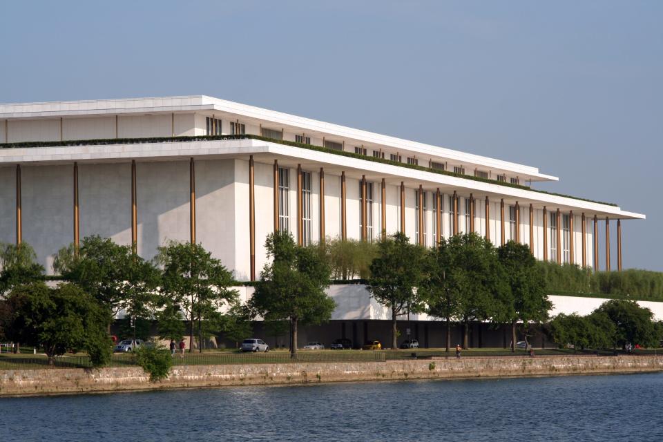 Kennedy Center or John F. Kennedy Memorial Center for the Performing Arts by the Potomac river in Washington DC