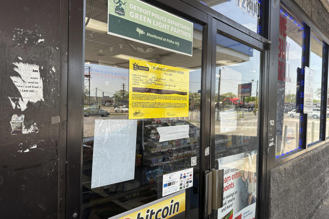 A gas station remains closed less than a week after a fatal shooting in Detroit, Michigan, Wednesday, May 10, 2023. Authorities in Detroit say a man fatally shot another customer inside a gas station and wounded two more in a dispute over a small purchase. (AP Photo/Ed White)