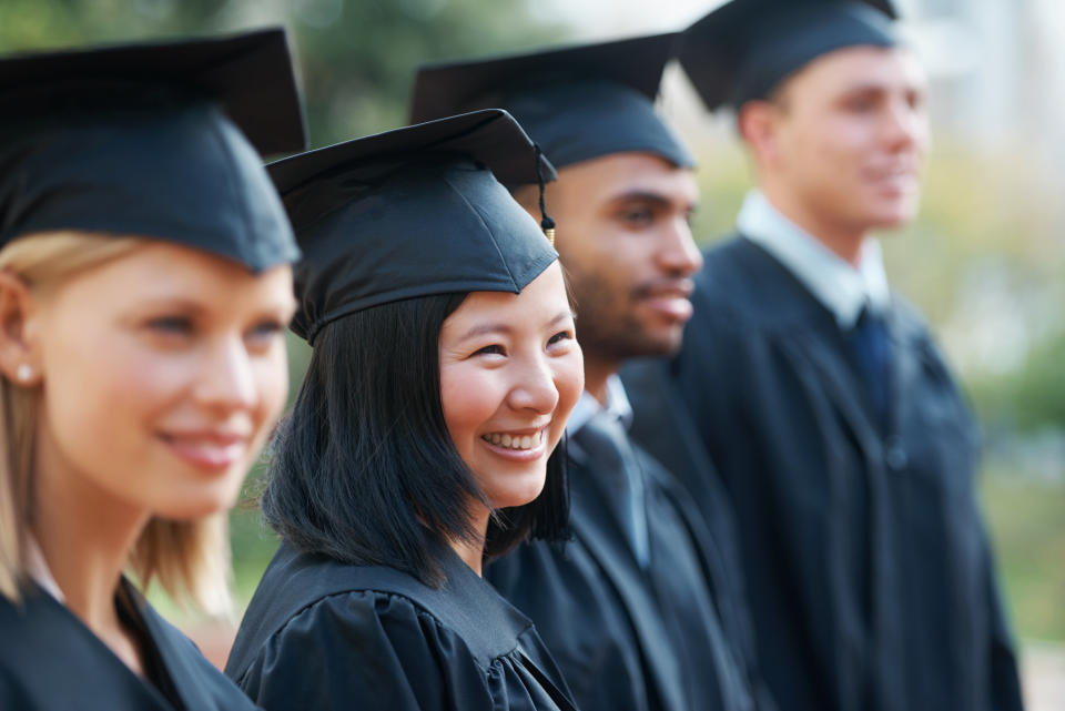 A group of graduates smiling