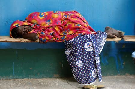 A woman lies on a bench at the Nigeria Air Force hospital in Bama, Borno, Nigeria, August 31, 2016. REUTERS/Afolabi Sotunde