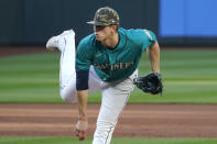 Seattle Mariners starting pitcher Chris Flexen follows through as he throws against the Cleveland Indians in the first inning of a baseball game Friday, May 14, 2021, in Seattle. (AP Photo/Elaine Thompson)