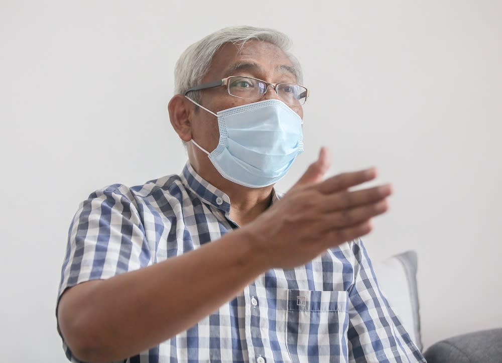 Perak DAP vice-chairman Abdul Aziz Bari speaks during a press conference at his home in Ipoh August 12, 2020. ― Picture by Farhan Najib