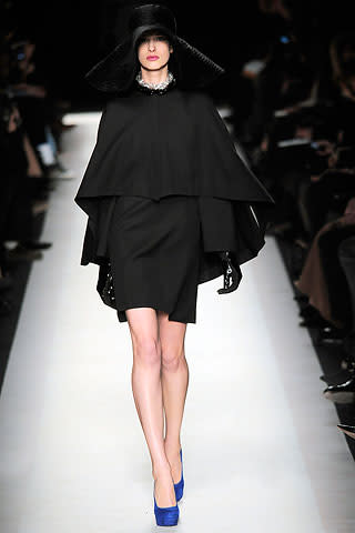 Yves Saint Laurent's classic black cape is chic, not kitchy.