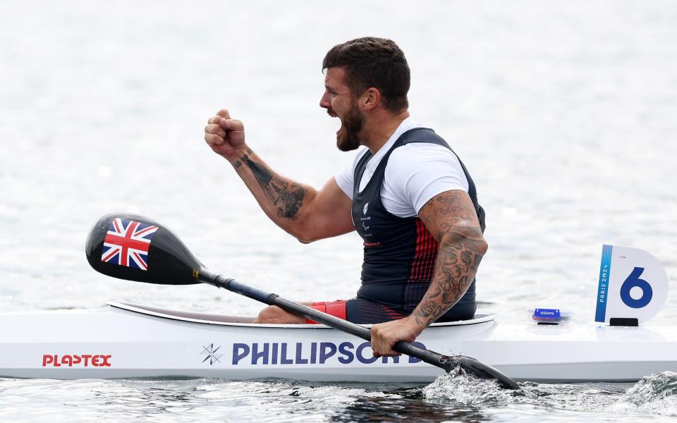 PARIS, FRANCE - SEPTEMBER 07: Silver medalist, David Phillipson of Team Great Britain, celebrates following the Men's Kayak Single 20m KL2 Final A on day ten of the Paris 2024 Summer Paralympic Games at Vaires-Sur-Marne Nautical Stadium