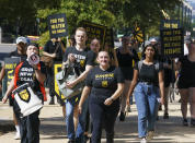 Climate change activists demonstrate outside the Hart Senate Office Building on Capitol Hill in Washington, Monday, Sept. 20, 2021. (AP Photo/J. Scott Applewhite)