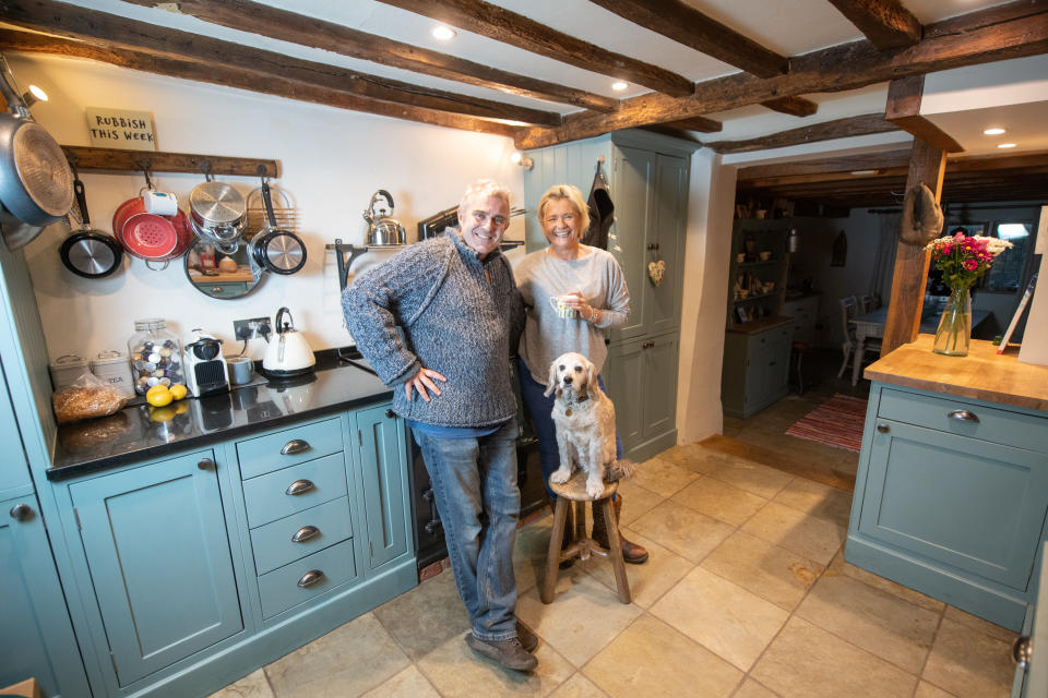 Jonny and Cressida Bromley with dog Jay. (SWNS)