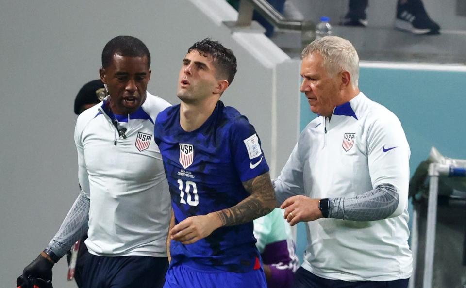 Christian Pulisic of USA is injured during the FIFA World Cup Qatar 2022 Group B match between IR Iran and USA at Al Thumama Stadium on November 29, 2022 in Doha, Qatar. - Stefan Matzke/Getty Images