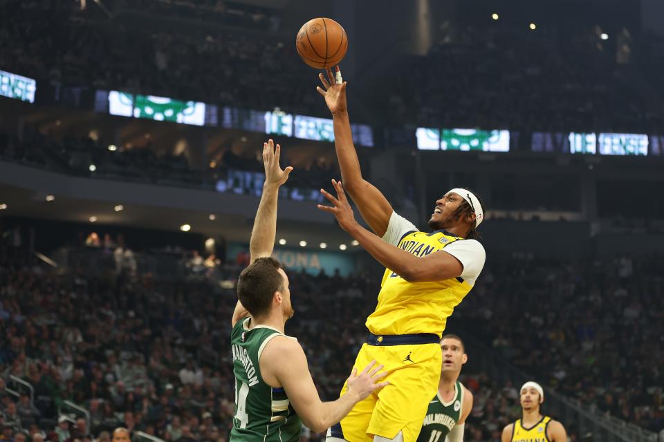 MILWAUKEE, WISCONSIN - APRIL 30: Myles Turner #33 of the Indiana Pacers shoots over Pat Connaughton #24 of the Milwaukee Bucks during the first half of game five of the Eastern Conference First Round Playoffs at Fiserv Forum on April 30, 2024 in Milwaukee, Wisconsin. NOTE TO USER: User expressly acknowledges and agrees that, by downloading and or using this photograph, User is consenting to the terms and conditions of the Getty Images License Agreement. (Photo by Stacy Revere/Getty Images)