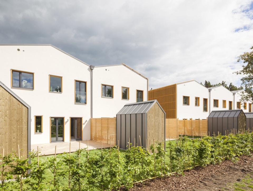 Each of Street Monkey's Prefab Row Houses has a small urban garden area in the rear.