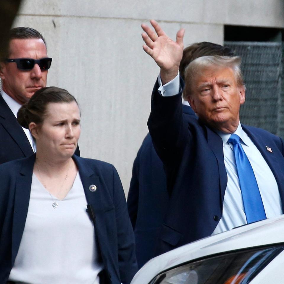 Donald Trump departs following the first day of his civil fraud trial